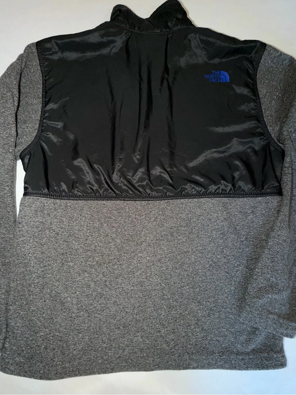 The North Face Kids Black and Gray Jacket with Blue Zip. C13,EMP